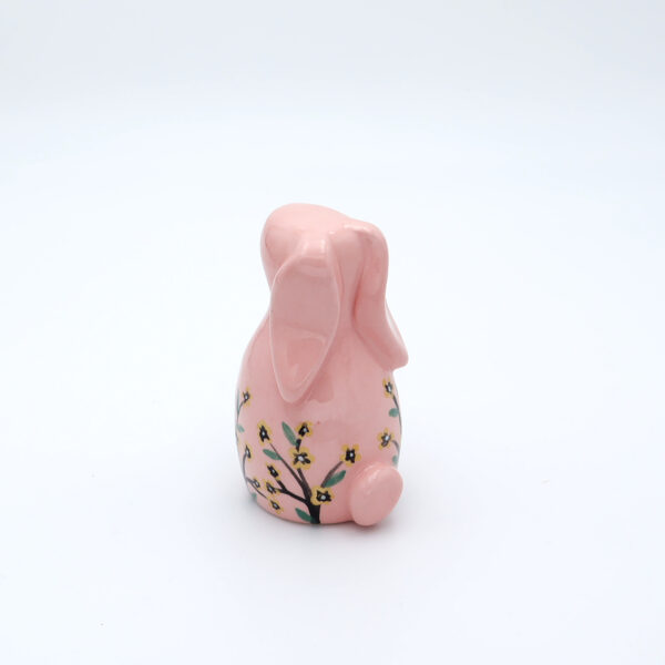 Petit lapin rose en céramique fleuri peint à la main