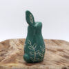 Petit lapin vert foncé en céramique