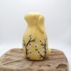 Lapin jaune fleuri en céramique