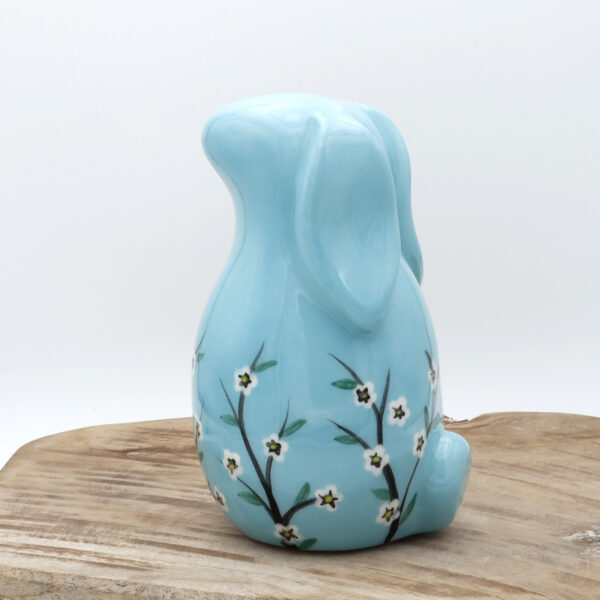 Lapin en céramique bleu fleuri