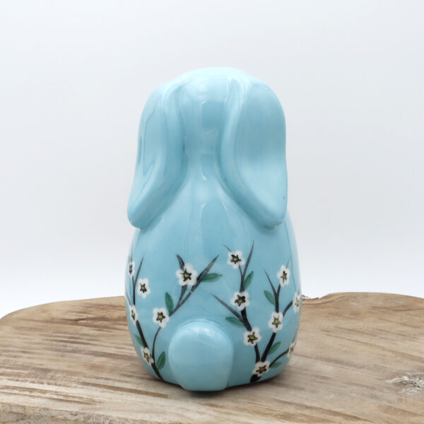 Lapin en céramique bleu fleuri