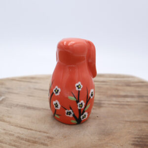 Lapin en faïence fleuri orange Victoria Céramique