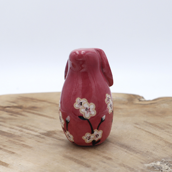 Lapin en céramique rose avec des fleurs Victoria Céramique