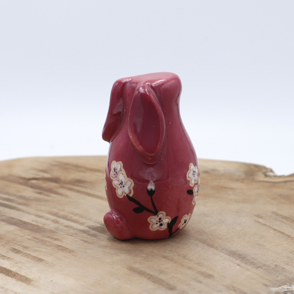 Lapin en céramique rose avec des fleurs Victoria Céramique