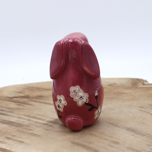 Lapin en céramique rose avec des fleurs Victoria Céramique