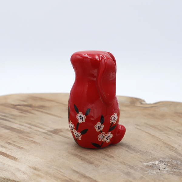 Lapin en céramique rouge avec des fleurs Victoria Céramique