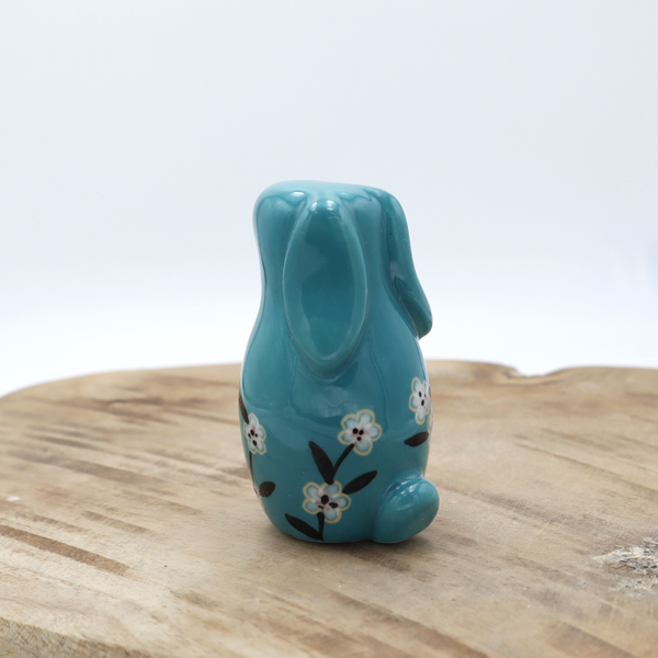 Lapin en céramique turquoise avec des fleurs Victoria Céramique