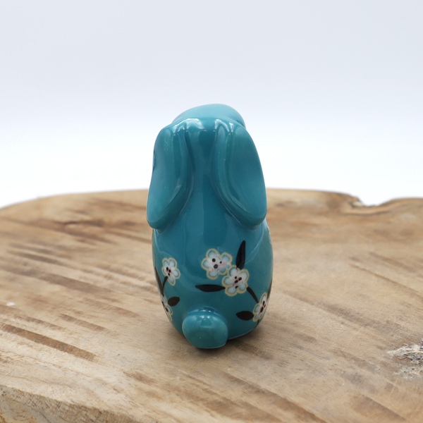 Lapin en céramique turquoise avec des fleurs Victoria Céramique