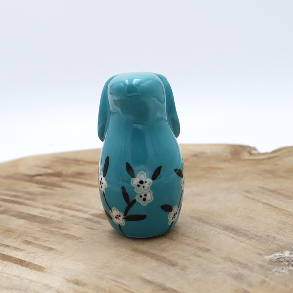 Lapin en céramique turquoise avec des fleurs Victoria Céramique